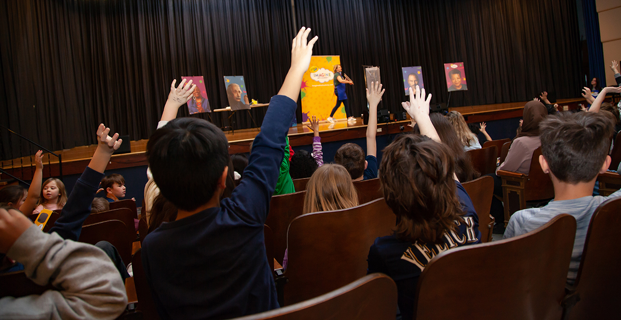kids engaged with imagine arts show
